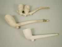 Three Victorian clay pipes