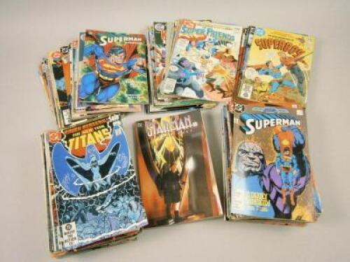 Three boxes containing various DC Superman comics
