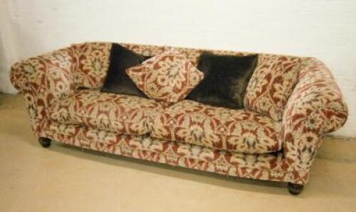 A large modern chesterfield sofa