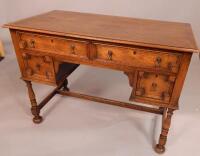 A 1920's oak writing table