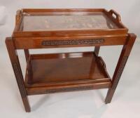 A 20thC Oriental hardwood tea trolley