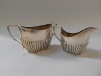 A Victorian silver milk jug and sugar bowl