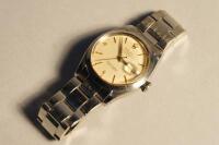 A mid size Rolex Oyster perpetual date model 1500