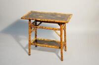 An Oriental bamboo side table