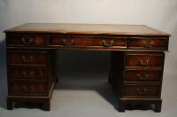 A Georgian style twin pedestal desk