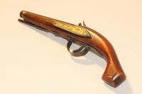 A reproduction flintlock pistol