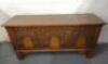 A Priory style cared oak coffer