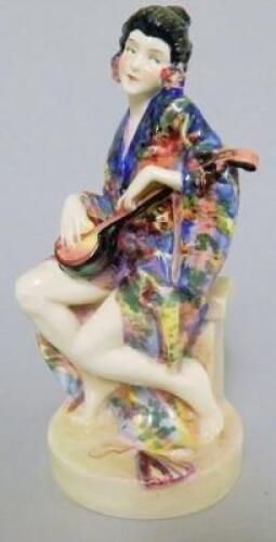 A Royal Doulton porcelain figure of a Geisha