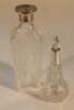 A silver mounted glass scent bottle and an Edwardian cut glass spirit decanter