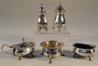 A silver salt and four EPNS condiment pieces.