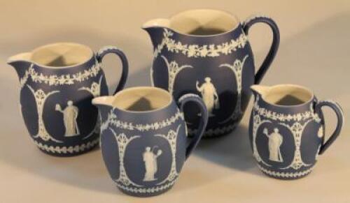 A set of four Wedgwood graduated blue Jasper dip jugs