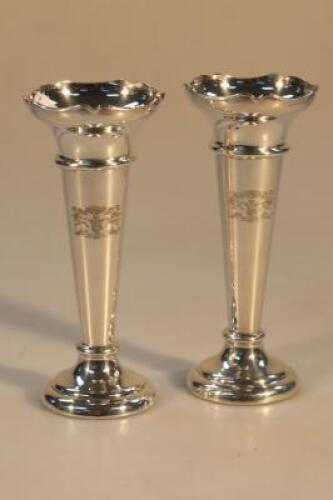 A pair of silver plated specimen vases