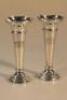 A pair of silver plated specimen vases