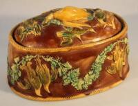 A 19thC Majolica game pie dish and cover