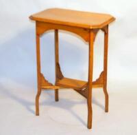 An Edwardian style oak occasional table.