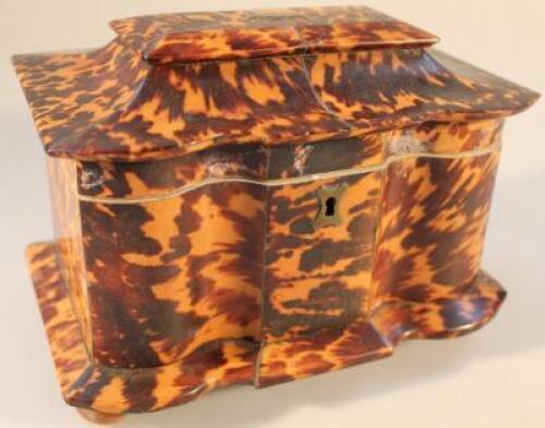 A Regency tortoiseshell and ivory tea caddy of shaped form