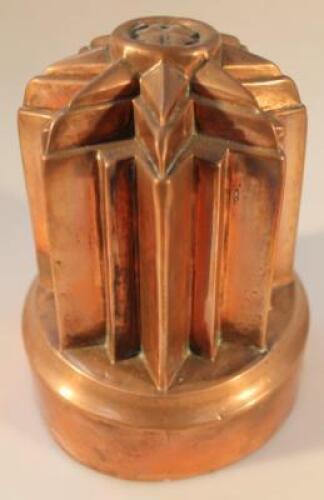 A Victorian copper geometric pattern jelly mould