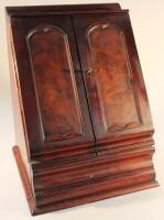 An early 19thC figured mahogany stationery cabinet