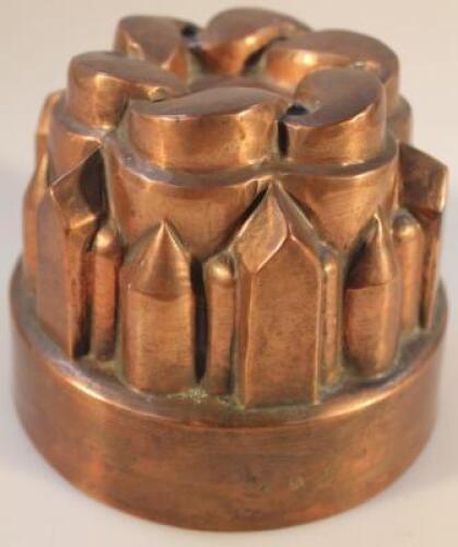 A Victorian circular copper jelly mould