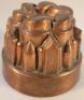 A Victorian circular copper jelly mould