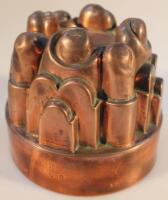 A Victorian circular copper jelly mould