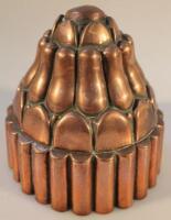 A Victorian copper circular jelly mould