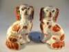 A pair of 19thC Staffordshire spaniels