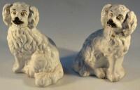 A pair of 19thC Staffordshire spaniels