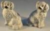 A pair of 19thC Staffordshire spaniels