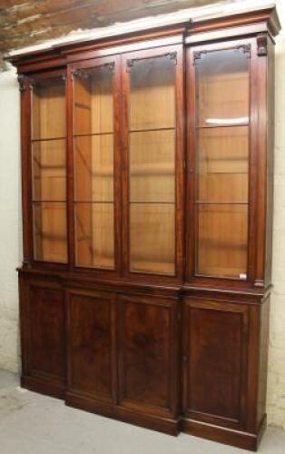 A 19thC mahogany slender breakfront bookcase cabinet