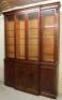 A 19thC mahogany slender breakfront bookcase cabinet