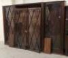 A late 19thC/early 20thC large mahogany breakfront bookcase with astragal glazed doors on plain plin