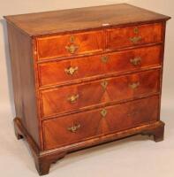 An 18thC walnut veneered chest