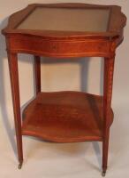 An Edwardian marquetry inlaid bijouterie cabinet