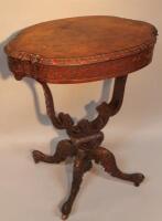 A mid Victorian walnut veneered sewing table