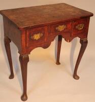 A George II mahogany veneered lowboy