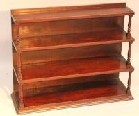 A 19thC four front small three tier bookcase