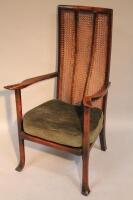 An early 20thC Bergere armchair.