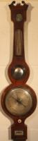 A 19thC mahogany banjo barometer by Ceppi & Shelbourne Grantham