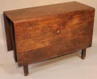 An 18thC oak drop leaf table