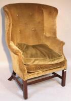 A 19thC wing back armchair