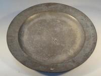 A large 19thC pewter charger