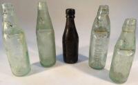 Four lemonade bottles and a beer bottle by Morris