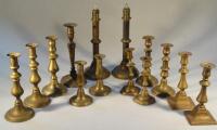 19thC and later brass candlesticks.