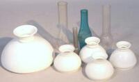 19thC milk glass oil lamp shapes and four glass funnels.