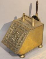 An early 20thC pressed brass coal box