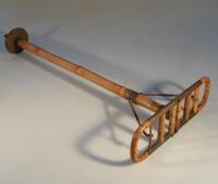 A Vintage bamboo and metal shooting stick