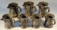 A group of seven 19thC and later pewter measures with pouring spouts.