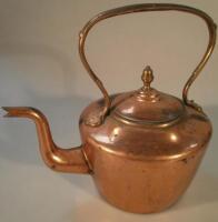 A 19thC copper kettle.