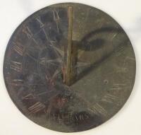 A metal sundial dated 1763